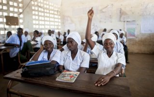 Fatou L. Juwara, 16 years old, in class, in Gambia