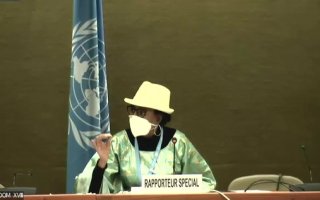 Special Rapporteur Dr Koumbou Boly Barry presenting her report