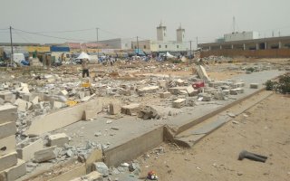 Rubble and detritus litters site of former school 