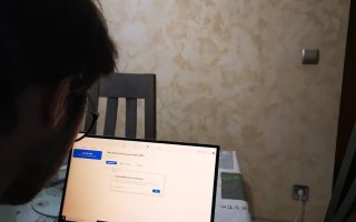 Man looking at computer screen