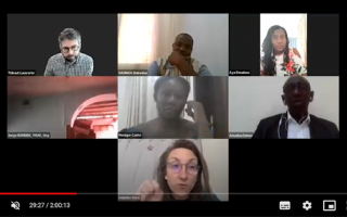 Screenshot of Zoom meeting showing 6 camera thumbnails with woman talking 