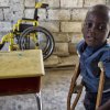 A young student poses in the classroom, Port-au-Prince, Haiti 